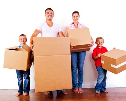 Furniture being carried carefully through a Stepney property
