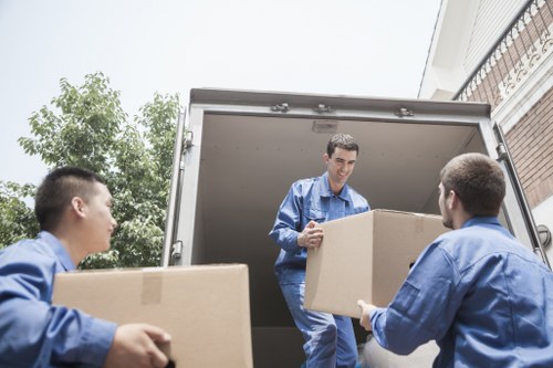 Organised office move with furniture, files, and equipment ready for transport