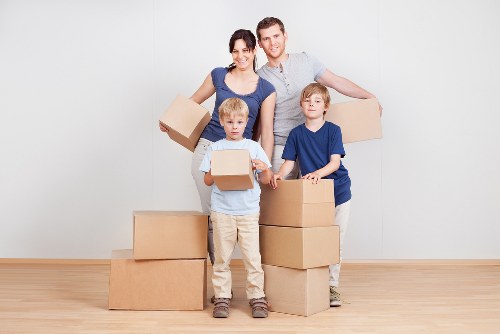 Commercial removal service transporting office furniture in Stepney