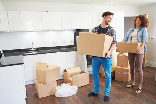 Boxes and furniture arranged for unloading at a new home in Stepney