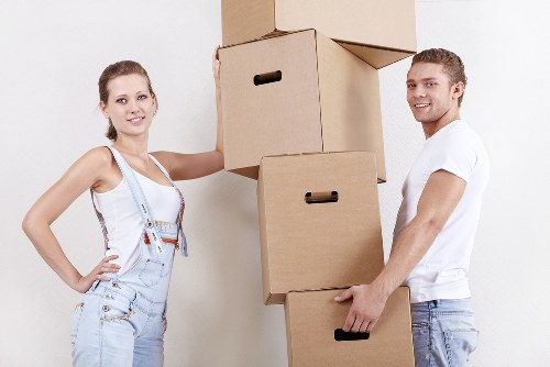 Professional movers loading furniture for a local Stepney relocation