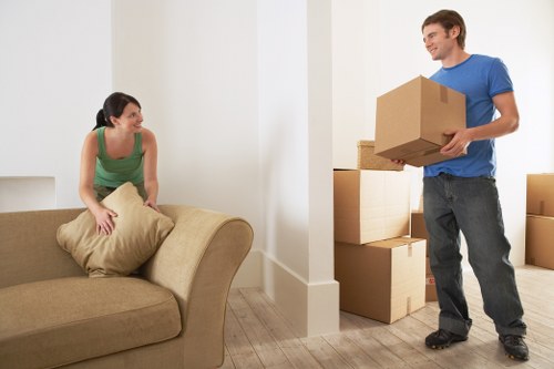 Careful furniture loading for a Stepney removals job by a man and van team