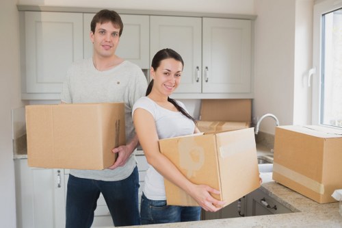 Team organising boxes and furniture for a local relocation